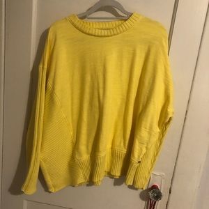 asymmetrical yellow sweater